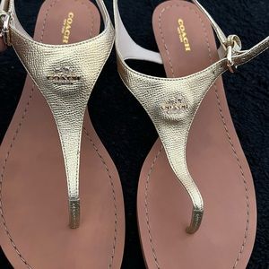 100% authentic brand new ￼Coach sandals size 11 color Brass/ gold